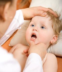 Dental health: examining child's teeth