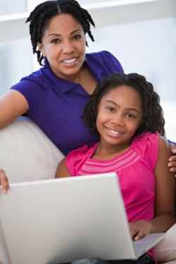 Parent and child using Internet together